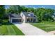 Charming traditional-style home with a spacious front yard, covered porch, and attached two-car garage at 4941 Southview Dr, Hickory, NC 28602