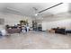 Functional garage space with concrete floors, built-in shelving, and utility access at 4941 Southview Dr, Hickory, NC 28602