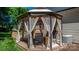 Cozy gazebo on a wooden deck, ideal for outdoor dining and relaxation at 4941 Southview Dr, Hickory, NC 28602