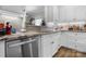 Stylish kitchen with granite countertops, stainless steel appliances, and ample cabinet space at 4941 Southview Dr, Hickory, NC 28602