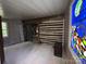 Spacious bedroom featuring log walls, a sliding glass door, and a stained glass window at 506 Waring Ct # Lot 1, Fort Mill, SC 29707