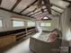Bedroom with slanted ceiling, daybed, several windows, and built-in shelves at 506 Waring Ct # Lot 1, Fort Mill, SC 29707
