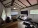 Cluttered bedroom features a bed, desk, triangle window and a slanted ceiling at 506 Waring Ct # Lot 1, Fort Mill, SC 29707