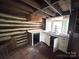 Cozy kitchen featuring an undermount sink, dishwasher and rustic wood walls and ceiling at 506 Waring Ct # Lot 1, Fort Mill, SC 29707