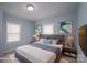 Stylishly decorated main bedroom with cozy decor, bedside lamps, and bright windows at 520 E Maple Ave, Gastonia, NC 28054