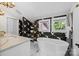 Elegant bathroom with a modern tub, marble floors, and stylish black and white swan-patterned wallpaper at 570 Blue Heron Rd, Salisbury, NC 28146