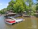 Lakefront property with a two-story boat dock, boat slip, and lake access at 570 Blue Heron Rd, Salisbury, NC 28146