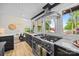 Gourmet kitchen features high-end appliances, ample counter space, and scenic lake views at 570 Blue Heron Rd, Salisbury, NC 28146