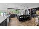 Kitchen boasts an island with seating, stainless steel appliances, and stylish pendant lighting at 570 Blue Heron Rd, Salisbury, NC 28146