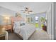 Spacious main bedroom with a king bed and views of the lake at 570 Blue Heron Rd, Salisbury, NC 28146