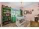 Bright office space with cheerful pink walls, ample storage, and natural light at 570 Blue Heron Rd, Salisbury, NC 28146