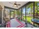 Relaxing screened porch with lake views and comfortable seating area at 570 Blue Heron Rd, Salisbury, NC 28146