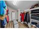 Spacious walk-in closet with ample storage, shelving, and wood flooring at 570 Blue Heron Rd, Salisbury, NC 28146