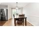 Bright dining area with a view to the backyard, showcasing a table with seating for four at 5804 Fairchase Ave, Charlotte, NC 28269