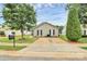 Charming single-story home with a well-manicured lawn and a paved driveway at 5804 Fairchase Ave, Charlotte, NC 28269