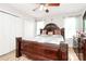 Elegant main bedroom featuring hardwood floors, neutral walls, and two large windows at 5804 Fairchase Ave, Charlotte, NC 28269