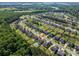 Aerial view of a residential neighborhood showcasing a community pool at 5849 Mcclintock Dr # 117, Denver, NC 28037