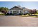 Well-maintained community clubhouse with attractive landscaping and ample parking at 5849 Mcclintock Dr # 117, Denver, NC 28037