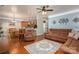 Spacious living area with hardwood floors, opening to the kitchen and dining area at 5849 Mcclintock Dr # 117, Denver, NC 28037