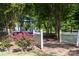 Picturesque garden featuring a white gazebo and a pink rose bush at 707 Saint Cloud Dr, Statesville, NC 28625