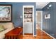 Living room featuring a built-in dry bar and hardwood floors at 707 Saint Cloud Dr, Statesville, NC 28625