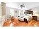 A spacious main bedroom features hardwood floors and custom window shutters at 707 Saint Cloud Dr, Statesville, NC 28625