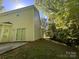 Backyard with patio and trees, perfect for outdoor entertaining and relaxation at 716 Coy Ct, Charlotte, NC 28216