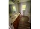 Bathroom featuring double sinks, wood vanity, and a large mirror over the vanity at 716 Coy Ct, Charlotte, NC 28216