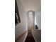 Bright foyer featuring vaulted ceilings, decorative lighting, and an arched window above the front door at 716 Coy Ct, Charlotte, NC 28216