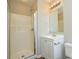 Bathroom featuring a glass door shower, vanity, and toilet at 7311 Fig Ln, Charlotte, NC 28215