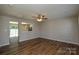 Spacious living area featuring an open layout and modern flooring at 7311 Fig Ln, Charlotte, NC 28215
