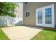 Backyard featuring a concrete patio with white privacy fence at 7711 Brisbane Ct, Charlotte, NC 28215