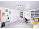 Bedroom is virtually staged with twin bed, desk, and storage at 786 Sw Treva Anne Sw Dr, Concord, NC 28027
