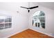 Bright bedroom with hardwood floors and a large window offering ample natural light at 786 Sw Treva Anne Sw Dr, Concord, NC 28027