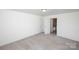 Neutral bedroom with closet, trim, and doorway at 786 Sw Treva Anne Sw Dr, Concord, NC 28027