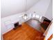 Open-concept living room boasts hardwood floors, fireplace, and flows into the kitchen at 786 Sw Treva Anne Sw Dr, Concord, NC 28027