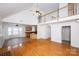 Open concept living room seamlessly connects to the kitchen, boasting hardwood floors at 786 Sw Treva Anne Sw Dr, Concord, NC 28027