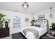 Nicely decorated bedroom with natural light, ceiling fan, and carpet flooring at 786 Treva Anne Sw Dr, Concord, NC 28027