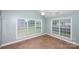 Light-filled room featuring tile flooring and large window with blinds at 786 Treva Anne Sw Dr, Concord, NC 28027