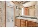 This full bath features a double vanity sink, tile floors, and plenty of storage at 811 Acclaim Dr, York, SC 29745