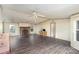 Spacious living room features a stone fireplace and wood flooring, offering a cozy and inviting atmosphere at 811 Acclaim Dr, York, SC 29745