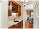 Elegant bar area with custom cabinetry, granite countertops, and stylish lighting at 8534 Highgrove St, Charlotte, NC 28277