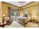 Bedroom with window view of the pool and patio, offering a peaceful retreat at 8534 Highgrove St, Charlotte, NC 28277