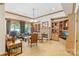 Spacious living room with stone fireplace, custom built-ins and large windows at 8534 Highgrove St, Charlotte, NC 28277