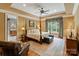 Serene main bedroom with a four-poster bed, elegant decor, and large windows at 8534 Highgrove St, Charlotte, NC 28277