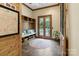 Functional mudroom with bench seating, storage, and outdoor access at 8534 Highgrove St, Charlotte, NC 28277