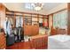 Spacious walk-in closet with custom wooden shelves, drawers, and convenient built-in laundry area at 8534 Highgrove St, Charlotte, NC 28277