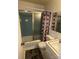Functional bathroom with a shower-tub combination, classic tile, and a vanity sink at 947 Ravendale Dr, Charlotte, NC 28216