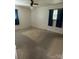 Spacious bedroom with carpet, window, and ample closet space at 947 Ravendale Dr, Charlotte, NC 28216