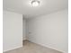 Carpeted empty bedroom with a neutral paint color and single door at 9533 Silverdale Ln, Charlotte, NC 28269